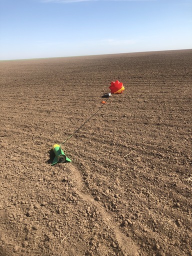 Rocket in a field after landing